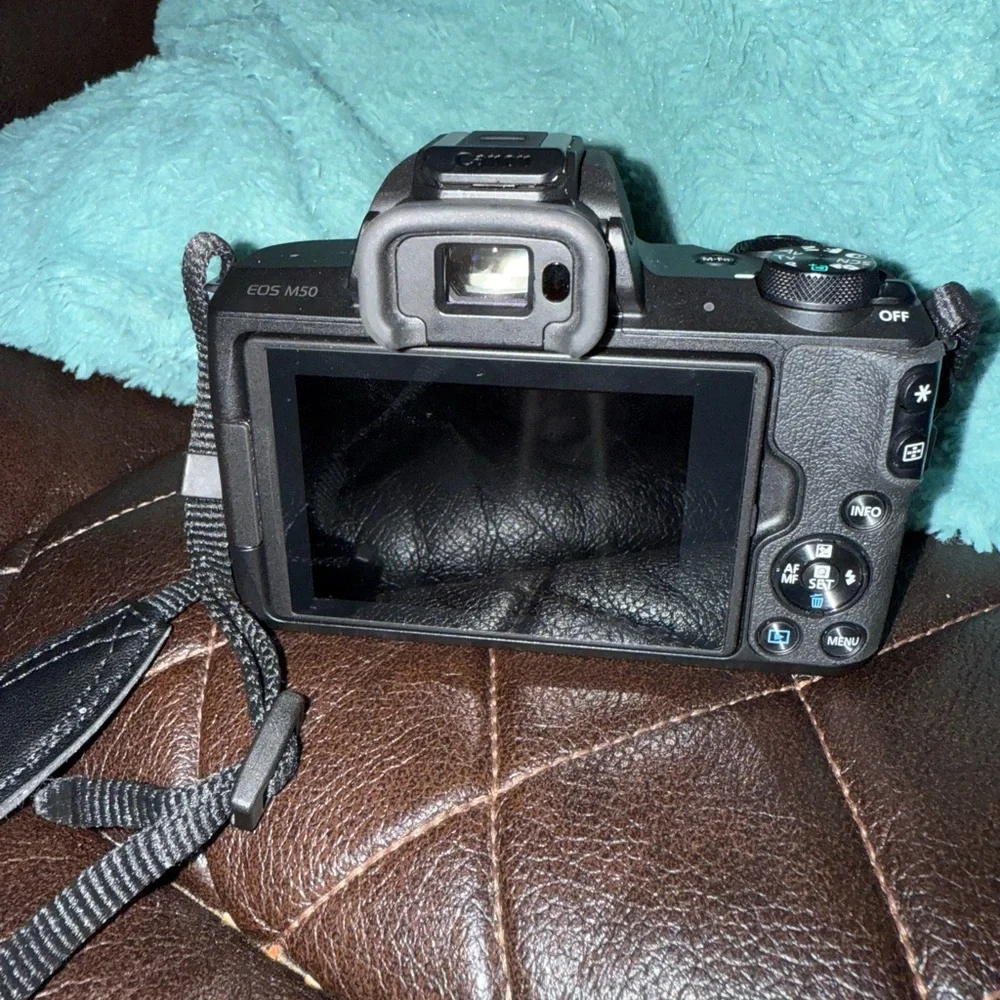 Canon Black DSLR Camera with Strap
